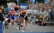 12 July 2008; Emma Davis, Ireland, leaves the transition zone between the swim and cycling disciplines of the Women's Elite Race at the triAthlone event. Over 1,500 competitiors took part in the third running of triAthlone sponsored by Waterways Ireland. TriAthlone will host the European Triathlon Championships in 2010, the first time the event has ever been held in Ireland. Waterways Ireland triAthlone Triathlon, Athlone, Co. Westmeath. Picture credit: Stephen McCarthy / SPORTSFILE