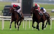 1 July 2000; Lady Upstage, with Michael Hills up, left, on the way to winning The Hunston Financial Pretty Polly Stakes from Preseli, with Eddie Ahern up, 5, and Lady in Waiting with Johnny Murtagh up, at the Curragh Racecourse in Kildare. Photo by Damien Eagers/Sportsfile