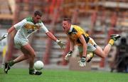 4 June 2000; Nigel Crawford of Meath in action against James Grennan of Offaly during the Bank of Ireland Leinster Senior Football Championship Quarter-Final match between Offaly and Meath at Croke Park in Dublin. Photo by Damien Eagers/Sportsfile