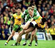 11 June 2000; Paddy Campbell of Donegal in action against Liam McBarron of Fermanagh during the Bank of Ireland Ulster Senior Football Championship Quarter-Final match between Donegal and Fermanagh at MacCumhail Park in Ballybofey, Donegal. Photo by Ray Lohan/Sportsfile