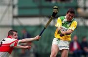 23 July 2000; Johnny Pilkington of Offaly in action against Benny Ward of Derry during the Guinness All-Ireland Senior Hurling Championship Quarter-Final match between Offaly and Derry at Croke Park in Dublin. Photo by Damien Eagers/Sportsfile