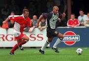 23 July 2000; Rio Ferdinand of West Ham United in action against Paul Byrne of St Patrick's Athletic during the Pre-Season Friendly match between St Patrick's Athletic and West Ham United at Richmond Park in Dublin. Photo by David Maher/Sportsfile