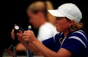 26 July 2000; Lucie Ahl of Great Britain tapes up her grip during her Dolmen Women's Irish Open First Round match against Nicole Remis of Austria at the Fitzwilliam Lawn Tennis Club in Dublin. Photo by David Maher/Sportsfile