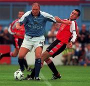 24 July 2000; Robert Taylor of Manchester City in action against Darren O'Keeffe of Drogheda United during the Pre-Season Friendly match between Drogheda United and Manchester City at United Park in Drogheda, Louth. Photo by David Maher/Sportsfile