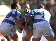 3 June 2000; Guy Easterby of Ireland is tackled by Gonzalo Quesada and Mauricio Reggardio of Argentina during the Rugby International match between Argentina and Ireland at Estadio Arquitecto Ricardo Etcheverri in Buenos Airies, Argentina. Photo by Matt Browne/Sportsfile