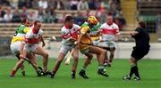 23 July 2000; Referee Michael Wadding throws the ball in between Oliver Collins and Ronan McCloskey of Derry and Johnny Dooley, 8, and Ger Oakley of Offaly during the Guinness All-Ireland Senior Hurling Championship Quarter-Final match between Offaly and Derry at Croke Park in Dublin. Photo by Damien Eagers/Sportsfile