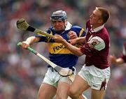 23 July 2000; John Leahy of Tipperary in a tussle for possession with Vinnie Maher of Galway during the Guinness All-Ireland Senior Hurling Championship Quarter-Final between Tipperary and Galway at Croke Park in Dublin. Photo by Brendan Moran/Sportsfile