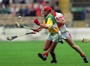 23 July 2000; Aidan Hanrahan of Offaly in action against Ronan McCloskey of Derry during the Guinness All-Ireland Senior Hurling Championship Quarter-Final match between Offaly and Derry at Croke Park in Dublin. Photo by Damien Eagers/Sportsfile
