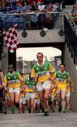 23 July 2000; Johnny Dooley leads the Offaly team out for the second half during the Guinness All-Ireland Senior Hurling Championship Quarter-Final match between Offaly and Derry at Croke Park in Dublin. Photo by Damien Eagers/Sportsfile