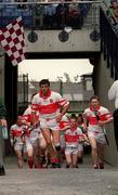 23 July 2000; The Derry team are lead out by captain Conor Murray for the second half of the Guinness All-Ireland Senior Hurling Championship Quarter-Final match between Offaly and Derry at Croke Park in Dublin. Photo by Damien Eagers/Sportsfile