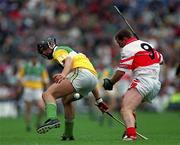 23 July 2000; Gary Hannify of Offaly in action against Michael Conway of Derry during the Guinness All-Ireland Senior Hurling Championship Quarter-Final match between Offaly and Derry at Croke Park in Dublin. Photo by Brendan Moran/Sportsfile