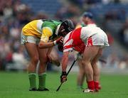 23 July 2000; Gary Hannify of Offaly and Michael Conway of Derry, after the Guinness All-Ireland Senior Hurling Championship Quarter-Final match between Offaly and Derry at Croke Park in Dublin. Photo by Brendan Moran/Sportsfile