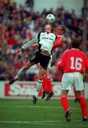 26 July 2000; Tony McCarthy of Shelbourne, in action against  Frode Johnsen of Rosenborg during the UEFA Champions League Second Qualifying Round First Leg match between Shelbourne and Rosenborg at Tolka Park in Dublin. Photo by David Maher/Sportsfile