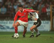 26 July 2000; David Byrne of Shelbourne in action against Fredrik Winsnes of Rosenborg during the UEFA Champions League Second Qualifying Round First Leg match between Shelbourne and Rosenborg at Tolka Park in Dublin. Photo by David Maher/Sportsfile