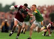 30 July 2000; Galway's Joe Bergin gets past Leitrim's Michael McGuinness during the Bank of Ireland Connacht Senior Football Championship Final between Galway and Leitrim at Dr Hyde Park in Roscommon. Photo by David Maher/Sportsfile