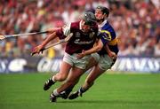23 July 2000; Ollie Fahy of Galway is tackled by Philip Maher of Tipperary during the Guinness All-Ireland Senior Hurling Championship Quarter-Final match between Galway and Tipperary at Croke Park in Dublin. Photo by John Mahon/Sportsfile