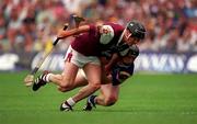 23 July 2000; Ollie Fahy of Galway is tackled by Philip Maher of Tipperary during the Guinness All-Ireland Senior Hurling Championship Quarter-Final match between Galway and Tipperary at Croke Park in Dublin. Photo by John Mahon/Sportsfile