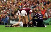 23 July 2000; Galway's Tommy Joyce gets treatment after picking up an injuy during the Guinness All-Ireland Senior Hurling Championship Quarter-Final between Tipperary and Galway at Croke Park in Dublin. Photo by David Maher/Sportsfile