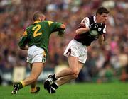 30 July 2000; Niall Finnegan of Galway is tackled by Derek Kelleher of Leitrim during the Bank of Ireland Connacht Senior Football Championship Final between Galway and Leitrim at Dr Hyde Park in Roscommon. Photo by Ray Lohan/Sportsfile