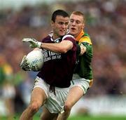 30 July 2000; Derk Savage of Galway is tackled by Michael McGuinness of Leitrim during the Bank of Ireland Connacht Senior Football Championship Final between Galway and Leitrim at Dr Hyde Park in Roscommon. Photo by Ray Lohan/Sportsfile