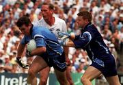 30 July 2000; Paddy Christie with the support of his Dublin team-mate David Byrne, goalkeeper, in action against Willie McCreery of Kildare during the Bank of Ireland Leinster Senior Football Championship Final between Dublin and Kildare at Croke Park in Dublin. Photo by Sportsfile