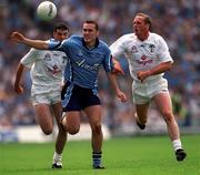 30 July 2000; Ciaran Whelan of Dublin in action against Willie McCreery, right, and Dermot Earley of Kildare during the Bank of Ireland Leinster Senior Football Championship Final between Dublin and Kildare at Croke Park in Dublin. Photo by Ray McManus/Sportsfile