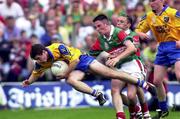 30 July 2000; Shane Sharkey of Roscommon in action against Alan Dillon and Conor Mortimer, right, of Mayo during the Connacht Minor Football Championship Final between Roscommon and Mayo at Dr Hyde Park in Roscommon. Photo by David Maher/Sportsfile
