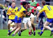 30 July 2000; Rory Keane of Mayo in action against Stuart Roddy, left and Benny Hynes of Roscommon during the Connacht Minor Football Championship Final between Roscommon and Mayo at Dr Hyde Park in Roscommon. Photo by David Maher/Sportsfile