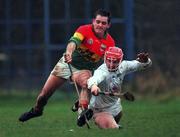 30 January 2000; Noel Casey of Kildare in action against Ciaran Jordan of Carlow during the Keogh Cup match between Kildare and Carlow at Naas GAA Ground in Kildare. Photo by Damien Eagers/Sportsfile