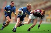 30 July 2000; Graham Joyce of Dublin in action against Kenneth Larkin of Westmeath during the Leinster Minor Football Championship Final between Dublin and Westmeath at Croke Park in Dublin. Photo by Ray McManus/Sportsfile
