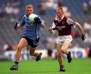 30 July 2000; Stephen Mills of Dublin in action against Kenneth Larkin of Westmeath during the Leinster Minor Football Championship Final between Dublin and Westmeath at Croke Park in Dublin. Photo by Damien Eagers/Sportsfile