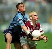 30 July 2000; Eric Sullivan of Westmeath is tackled by Alan Brogan of Dublin during the Leinster Minor Football Championship Final between Dublin and Westmeath at Croke Park in Dublin. Photo by Damien Eagers/Sportsfile