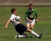 5 May 2000; Keith Graydon of Ireland in action against Neil Austin of England during the UEFA U16 European Championship Finals Group A match between Republic of Ireland and England at Ashkelon Municipal Stadium in Ashkelon, Israel. Photo by David Maher/Sportsfile