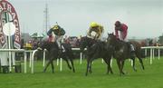 31 July 2000; Gamekeeper, with Aidan Fitzgerald up, right, on their way to win the GPT Galway Handicap from second place Aboriginal, with John O'Meara up, centre, and fourth placed Darialann, with Kevin O'Ryan up, during the opening day of the Galway Racing Festival at Galway Racecourse in Ballybrit, Galway. Photo by Matt Browne/Sportsfile