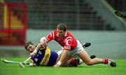 2 April 2000; Diarmuid O'Sullivan of Cork in action against Paul Shelly of Tipperary during the Church & General National Hurling League Division 1B match between Cork and Tipperary at Páirc Uí Chaoimh in Cork. Photo by Brendan Moran/Sportsfile