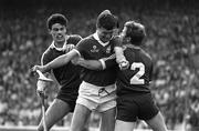 7 September 1986; Jimmy Barry Murphy of Cork, centre, is blocked by Sylvie Linnane, 2, and Gerry McInerney of Galway during the All-Ireland Senior Hurling Championship Final between Cork and Galway at Croke Park in Dublin. Photo by Ray McManus/Sportsfile