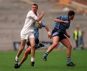 30 July 2000; Ronan Sweeney of Kildare in action against Jonathan Magee of Dublin during the Bank of Ireland Leinster Senior Football Championship Final between Dublin and Kildare at Croke Park in Dublin. Photo by Damien Eagers/Sportsfile