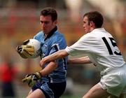 30 July 2000; Paddy Christie of Dublin is tackled by Tadgh Fennin of Kildare during the Bank of Ireland Leinster Senior Football Championship Final between Dublin and Kildare at Croke Park in Dublin. Photo by Damien Eagers/Sportsfile