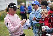 26 May 2015; Miguel Ángel Jiménez signs autographs following his practice round. Dubai Duty Free Irish Open Golf Championship 2015, Practice Day 2. Royal County Down Golf Club, Co. Down. Picture credit: Ramsey Cardy / SPORTSFILE