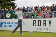 27 May 2015; Rory McIlroy tees off on the 1st hole. Dubai Duty Free Irish Open Golf Championship 2015, Pro-Am. Royal County Down Golf Club, Co. Down. Picture credit: Ramsey Cardy / SPORTSFILE