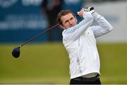 27 May 2015; Former jockey A.P McCoy hits his tee shot from the 1st hole. Dubai Duty Free Irish Open Golf Championship 2015, Pro-Am. Royal County Down Golf Club, Co. Down. Picture credit: Ramsey Cardy / SPORTSFILE