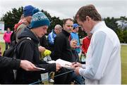27 May 2015; Former jockey A.P McCoy signs autographs for fans ahead of his round. Dubai Duty Free Irish Open Golf Championship 2015, Pro-Am. Royal County Down Golf Club, Co. Down. Picture credit: Ramsey Cardy / SPORTSFILE