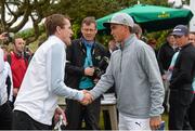 27 May 2015; Former jockey A.P McCoy shakes hands with Rickie Fowler. Dubai Duty Free Irish Open Golf Championship 2015, Pro-Am. Royal County Down Golf Club, Co. Down. Picture credit: Ramsey Cardy / SPORTSFILE