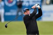 27 May 2015; Former cricketer Shane Warne hits his tee shot from the 1st hole. Dubai Duty Free Irish Open Golf Championship 2015, Pro-Am. Royal County Down Golf Club, Co. Down. Picture credit: Ramsey Cardy / SPORTSFILE