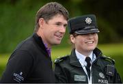 27 May 2015; Padraig Harrington poses for a picture with PSNI Chief Inspector/Area Commander Gillian West before starting his round. Dubai Duty Free Irish Open Golf Championship 2015, Pro-Am. Royal County Down Golf Club, Co. Down. Picture credit: Oliver McVeigh / SPORTSFILE