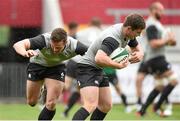 27 May 2015; Ireland's Luke McGrath is tackled by Colm O'Shea during the captain's run. Thomond Park, Limerick. Picture credit: Diarmuid Greene / SPORTSFILE