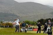 27 May 2015; Rory McIlroy plays his 2nd shot on the 11th fairway. Dubai Duty Free Irish Open Golf Championship 2015, Pro-Am. Royal County Down Golf Club, Co. Down. Picture credit: Ramsey Cardy / SPORTSFILE
