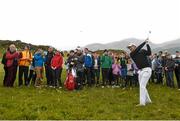 27 May 2015; Padraig Harrington plays his 2nd shot on the 11th hole. Dubai Duty Free Irish Open Golf Championship 2015, Pro-Am. Royal County Down Golf Club, Co. Down. Picture credit: Ramsey Cardy / SPORTSFILE
