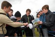 27 May 2015; Former jockey A.P McCoy signs autographs for fans during his round. Dubai Duty Free Irish Open Golf Championship 2015, Pro-Am. Royal County Down Golf Club, Co. Down. Picture credit: Ramsey Cardy / SPORTSFILE