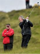 27 May 2015; Pat Jennings, former Spurs, Arsenal and Northern Ireland goalkeeper, hits his second shot on the 14th hole. Dubai Duty Free Irish Open Golf Championship 2015, Pro-Am. Royal County Down Golf Club, Co. Down. Picture credit: Ramsey Cardy / SPORTSFILE